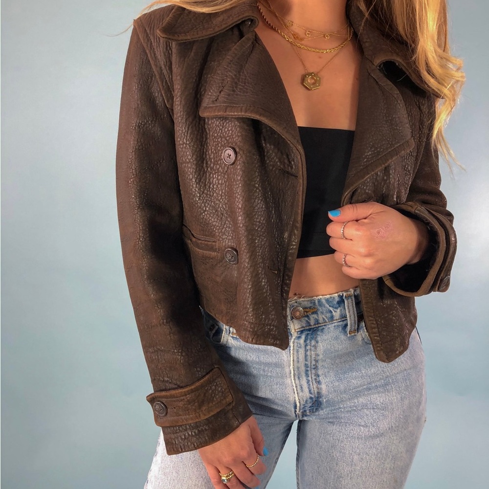 Brown pebble leather double breasted leather jacket lined with a quilted interio